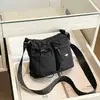 Bolso de nailon de moda para mujer 2026 nuevo modelo bolsa cruzada ins bolsa de hombro casual bolsa de exterior moderna bolso de mano de viaje