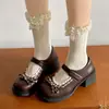 Sapatos de couro estilo retrô com salto grosso e laço discreto, novos sapatos Mary Jane estilo britânico de outono de 2026 para mulheres combinarem com saias