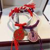 Diseño original morado rojo fantasma de montaña cuerda de mano para gastar dinero cuerda de algodón tejida a mano por Seiko texto juego joyería de moda cuentas de Buda cuerda de mano