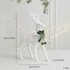 Enfeite de rena branca flocado de Natal transfronteiriço com laço e sino, Decoração de vitrine de shopping center de Natal