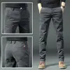 Calças casuais masculinas de alta qualidade de Hong Kong, calças sociais finas de perna reta para o verão, calças compridas da moda estilo coreano, confortáveis e versáteis
