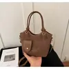 Bolso de mano transfronterizo, nuevo estilo 2026 para mujer, bolso de hombro moderno y versátil, bolso cruzado tipo cubo retro de moda