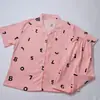 Pijama de Algodão Bolha Novo Estilo Cardigã Feminino Verão Calça Manga Curta Estilo Popular do Instagram Tecido Amassado Conjunto Estudante Roupas de Casa