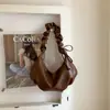 Bolso Vintage de Gran Capacidad para Mujer Transfronterizo 2026 Nuevo Bolso Cruzado de Hombro Plegado Casual Bolso tipo Dumpling Texturizado para Viajes