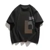 Camiseta de Manga Corta para Hombre Estilo Americano Minimalista de Moda 2025 Verano Nueva Estilo Hong Kong Estampada Holgada Versátil de Manga Corta