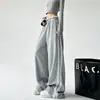 Pantalones de pierna ancha con retazos de encaje con sentido del diseño para mujer, nuevos pantalones casuales rectos de otoño e invierno 2025, pantalones largos adelgazantes