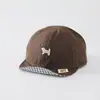 Sombrero de color sólido versátil para bebé con ala suave al por mayor nuevo sombrero solar transpirable para niño pequeño gorra de béisbol linda de cachorro para bebé