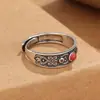 Abanico literario de apertura hecho a mano con patrón Xiangyun incrustado en anillo de ágata rojo del sur patrón étnico auspicioso retro anillo de comida