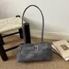 Moda para ir al trabajo color liso para mujer 2026 hebilla de cinturón de cuero PU elegante casual gran capacidad exquisita bolso de hombro baguette para debajo del brazo