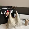 Bolsa de Ombro Feminina Suede Retrô 2025 Outono e Inverno Nova Moda Nicho Bolsa Tote Grande Capacidade Bolsa de Ombro