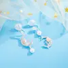 Pendientes de Borla de Perla Lunar Flor de Rosa Estilo Francés para Mujer, Diseño de Nicho, Elegantes y Graciosos, Pendientes de Nuevo Estilo 2026