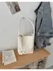 Bolso de mujer de nicho transfronterizo de alta gama, nuevo bolso tote con patrón tejido vintage con neceser a juego, bolso de hombro para el día a día, moderno