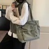 Bolsa de Lona de Grande Capacidade para Mulheres 2025 Novo Estilo Bolsa Tote para Trabalho e Deslocamento Bolsa de Mão Casual para Estudantes Bolsa de Ombro