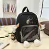 Mochila nueva y linda de dibujos animados para mujer, mochila transparente de moda con bloques de color, bolsa ligera versátil para exteriores y escuela casual