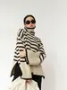Suéter de Cuello Alto Rayado Transfronterizo para Mujer Otoño e Invierno 2026 Estilo Perezoso Holgado para Mujer Chaqueta de Punto con Aberturas para Mujer