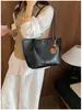 Bolsa de ombro tote vintage transfronteiriça para mulheres, grande capacidade, novo estilo inverno 2026, conjunto versátil de bolsas de mão