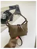 2026 Nueva Bolsa de Almohada de Terciopelo Gamuza Bolso de Mano Retro de Nicho Bolso para Mujer Bolso de Hombro Cruzado Simple Versátil