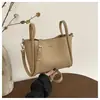 Bolsos de Mujer de Moda Este Año 2026 Nuevos Bolsos de Mano de Nicho Súper Populares con un Toque de Alta Gama Bolsos Versátiles de Hombro y Cruzados