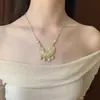 Nueva Cadena de Suéter de Bola de Metal Esmaltada Estilo Chino Flor de Loto para Mujer, Moda Retro Estilo Nacional, Cadena de Cuello de Cuerda Trenzada Exquisita de Alta Gama