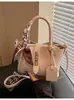 Bolsos de Mujer de Moda Transfronterizos Este Año, Nuevos Bolsos Cruzados de Moda Primavera-Verano 2026, Bolsos Cubo de Mano con Textura de Alta Calidad