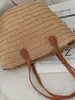 Bolsas tejidas de paja personalizadas para mujer 2026 Nuevo bolso de hombro de verano para viajes de vacaciones Bolso tote de moda para el trabajo