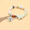 Venta al por mayor del fabricante Pulsera de Cerámica de Estilo Chino Nuevo de Nicho Pulsera Magnética de Perlas de Estrella de Mar Pulsera para Niños Joyería Retro de Estilo Nacional Venta al por mayor