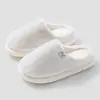 2025 Zapatillas de Conejo de Color Puro Transfronterizas Invierno Nuevas Zapatillas de Algodón para Hombres y Mujeres Hogar Interior Antideslizantes Cálidas Felpa Amor