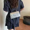 Bolsa pequena de corrente com padrão de losangos para mulheres, estilo coreano, alto valor estético, design simples, novo modelo de verão 2026, bolsa de ombro e transversal, moderna e estilosa