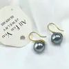 [gancho de cobre] concha marina perla tacones altos nicho gris aretes de perlas grandes aretes ins aretes de aguja plateada