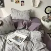 Conjunto de cama de quatro peças em gaze dupla para mãe e bebê, grau A, com estampa floral retrô, incluindo uma capa de edredom, um lençol de elástico e um conjunto de lençol de três peças para dormitórios.