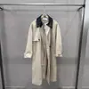 Outono/Inverno 2026 Patchwork Transfronteiriço Padrão Tecido Embossado Gola de PU Cinto Longo Minimalista de Alto Padrão Trench Coat Longo