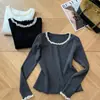 Tricô Coreano Doce com Gola de Renda para Mulheres no Inverno Novo Design Versátil Top de Base de Manga Longa