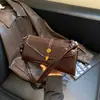 Bolsa de Mão Retrô de Nicho Feminina 2026 Nova Bolsa Transversal Simples e Chique Bolsa Quadrada Pequena Casual Bolsa de Ombro para Comércio Exterior