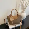 Bolso Bandolera para Mujer Versión Coreana 2026 Nuevo Bolso de Hombro de Moda para Mujer Bolso de Mano Versátil para el Trabajo al por Mayor