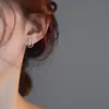 Pendientes de aro minimalistas con un diseño único, pendientes de nicho de plata de ley para mujer, lujo ligero con un toque de alta gama, pendientes de botón de perla, pendientes largos de borla