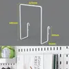 Tablero perforado bidimensional sin perforaciones para colgar en la pared, tablero colgante para almacenamiento de insignias Guzi, estante de exhibición pequeño de escritorio para pared