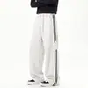 Nuevos Pantalones Casuales para Hombre 2026 para Otoño e Invierno, Marca de Moda de Punto Estilo Americano Pantalones de Pierna Ancha Curvos con Tres Rayas