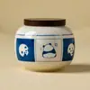 Marco de fotos de fábrica Lata de té de panda Tarro de té de cerámica Tarro de almacenamiento de granos sellado pequeño portátil para el hogar A prueba de luz y humedad