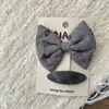 Nuevo clip para el pelo de conejo gris gris con lazo, combinación de amor para niños, clip para el pelo de bebé, clip para flequillo