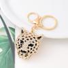 Fornecimento direto da fábrica Chaveiro de carro com cabeça de leopardo criativo Pingente de metal de liga de zinco Pingente de bolsa com cabeça de tigre e diamante