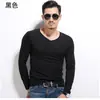 Ropa interior popular otoño e invierno camiseta de manga larga para hombre delgada elástica ajustada camiseta de manga larga para hombre color liso casual camisa base moda