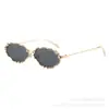 Gafas de sol metálicas ovaladas con incrustaciones de diamantes transfronterizas, gafas de sol retro cat-eye a la moda, gafas de montura pequeña de moda para mujer
