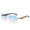 Gafas de sol de moda con montura de conexión metálica sin montura, venta al por mayor transfronteriza, nuevas gafas de sol polarizadas para hombres y mujeres.