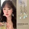 Aretes Colgantes de Flor Blanca Larga Súper Hada Té Blanco Fresco para Mujeres Estilo Vacaciones en la Playa Pendientes y Clips de Oreja Exagerados