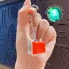 Llavero colgante de Tetris de nueve teclas de moda en colores macaron, accesorio de juguete de botón para aliviar el estrés, venta al por mayor