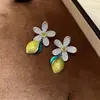 Pendientes de flor de circón súper brillantes con aguja de plata, gota de aceite de limón, pendientes de moda versátiles, pendientes de lujo ligero de alta gama para mujer