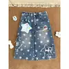 Chao Li Youhuo pingente de estrela jeans cropped rasgado para mulheres 2026 shorts largos retos casuais de perna larga