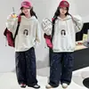 Ropa Infantil Transfronteriza al por Mayor Sudadera para Niñas 2026 Otoño Nuevo Estilo Infantil Holgada Estilo Coreano Top Niños Medianos y Grandes con Capucha Moderna