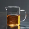 Taza medidora de vidrio engrosado al por mayor para fabricantes, con escala y asa, resistente al calor y a prueba de explosiones, vaso de agua para repostería casera
