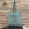 Bolsa de Ombro com Recorte de Laço Estilo Doce 2024 Nova Bolsa de Palha Casual Versátil Elegante Bolsa Tote de Tricô